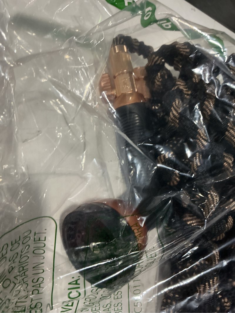 Condition photo showing As Is for 100ft expandable garden hose - with 10-function spray nozzle - lightweight, flexible, 3/4" solid bra