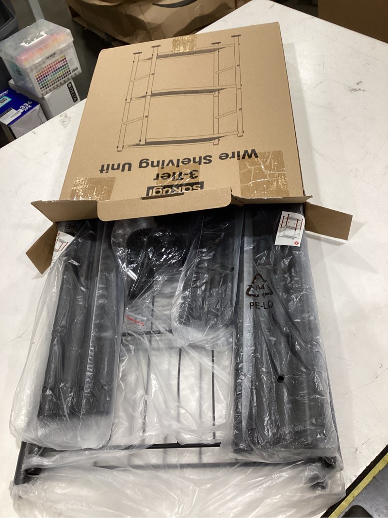 Condition photo showing Good Condition for sakugi storage shelves - 3 tier shelf organizer, sturdy metal garage shelving with adjustable leveling feet, space-saving shelves organizer for pantry, laundry, kitchen (18" x 12" x 30", black) black 18.0w x 12.0d x 30.0h (3t)