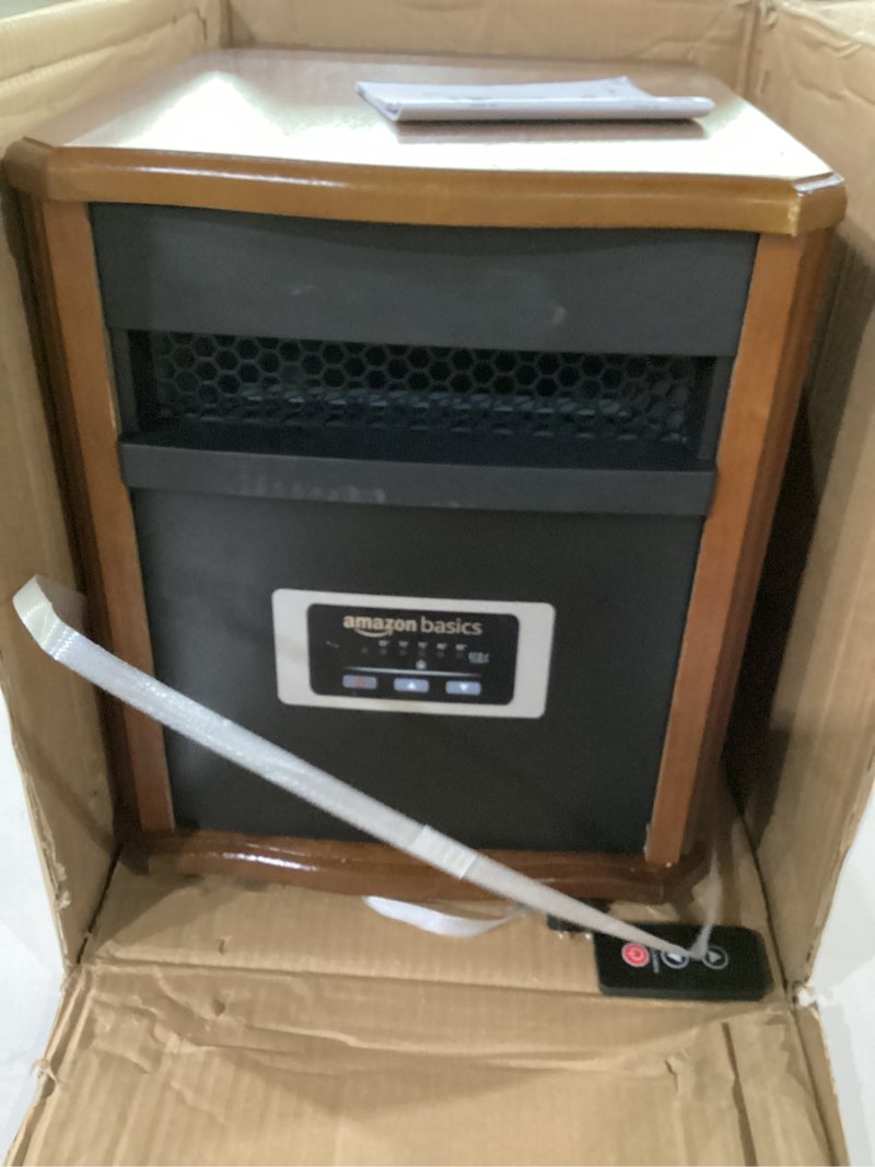 Condition photo showing As Is for does not work has damage  amazon basics portable space heater with remote control, adjustable thermostat, indoor use, energy-saving setting, led display, classic wood casing, 1500w, 12\"d x 13\"w x 16\"h, brown