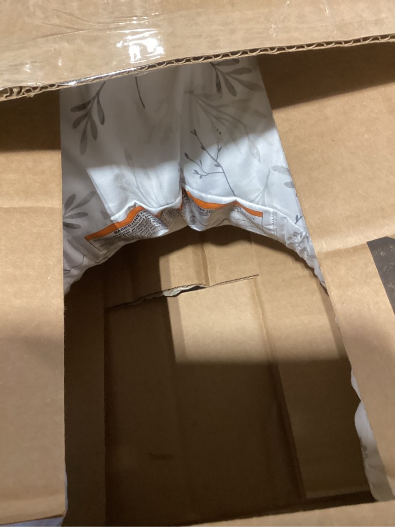 Condition photo showing New/Like New for Boppy Nursing Pillow - Firm, Ergonomic U-Shaped Bottle and Breastfeeding Pillow with High Lift for Comfort and Support, Spacious Surface - Gray Gentle Leaves New Nursing Pillow Gray Gentle Leaves