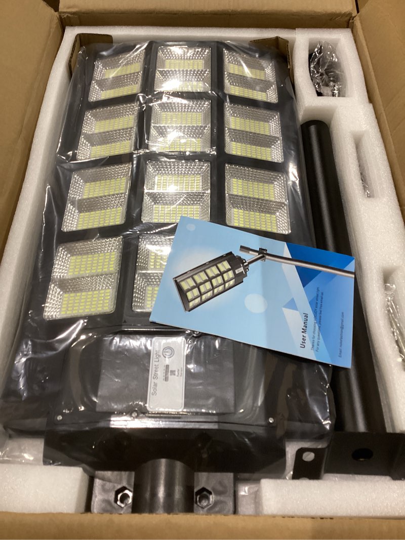 Condition photo showing New/Like New for Deepn 2 Pack 2400W Solar Street Light, 260000 Lumens Dusk to Dawn Solar Flood Lights Outdoor Motion Sensor IP66 Waterproof Street Lights Solar Powered for Parking Lots, Garage, Basketball Court 2400W*2PACK