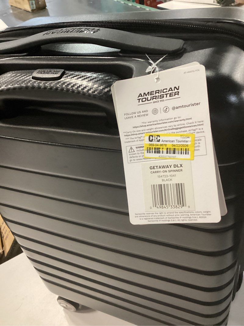 Condition photo showing New/Like New for american tourister open front hardside carry on spinner suitcase - black