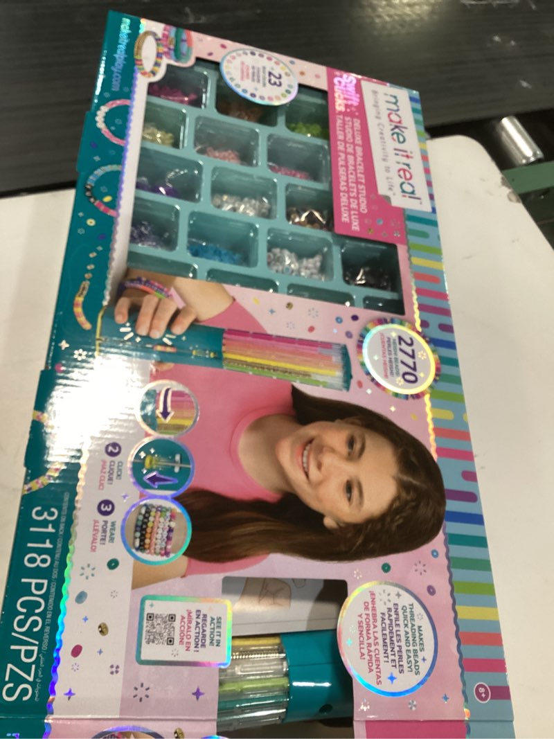 Condition photo showing Good Condition for Make It Real Swift Clicks Deluxe Bracelet Studio - Create Colorful Friendship Bracelets with Swift Clicks Deluxe Design Tool - Includes Beads and Charms Deluxe Swift Clicks