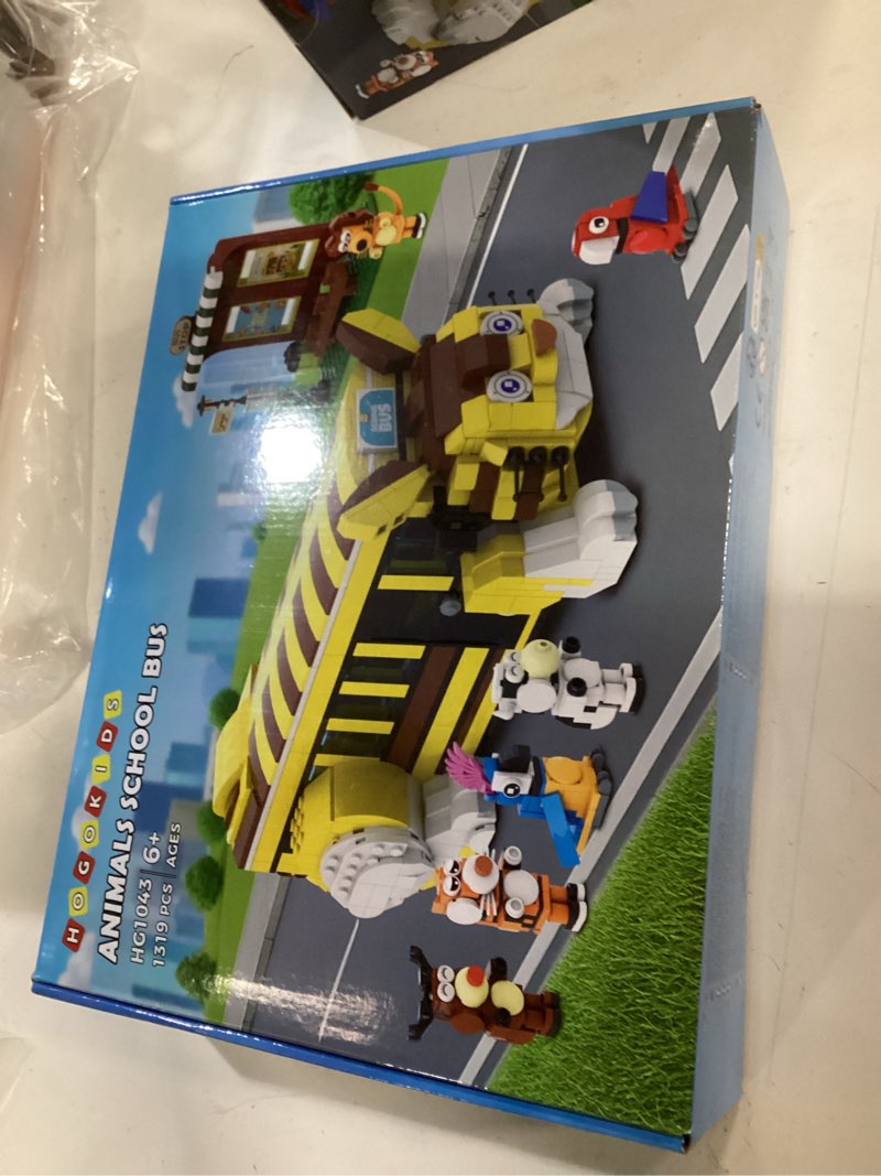 Condition photo showing New/Like New for HOGOKIDS Cat School Bus Building Set with Light - 1319PCS Adventure Building Toy with 6 Animals & Station Creative City Bus Lion Parrots Elk Tiger Blocks Playset Gift for Adults Kids Girls Boys 8-12+