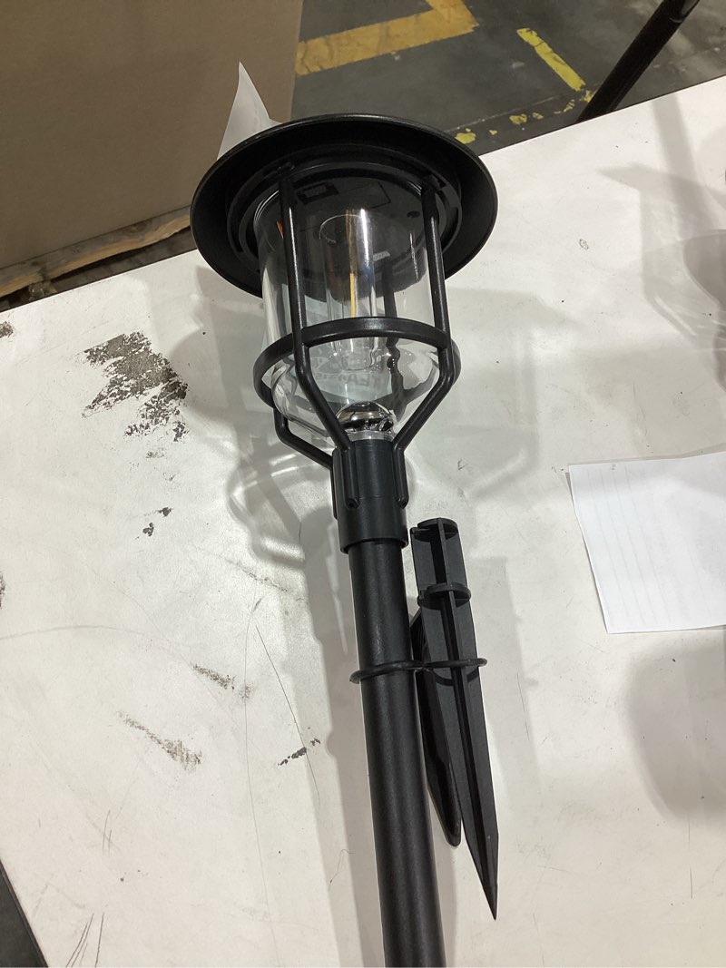 Condition photo showing As Is for harbor breeze path light 15 -lumens 0.2 -watt black solar led outdoor path light ( 3000-k )