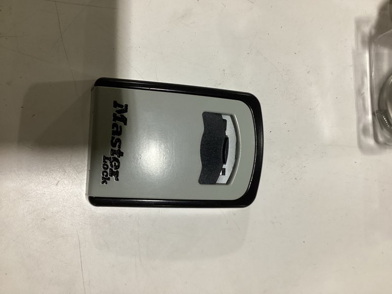 Condition photo showing As Is for Master Lock Set Your Own combination Wall Mount Lock Box, 5 Key capacity, Black 5401EC