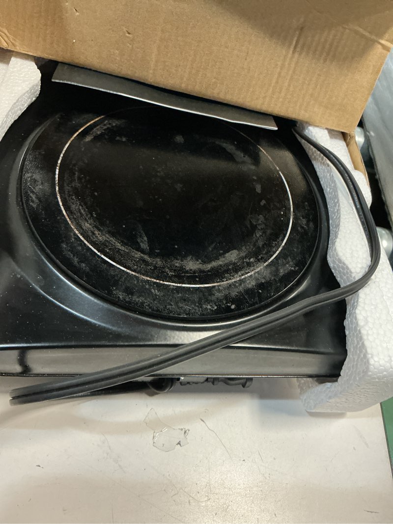 Condition photo showing As Is for ovente countertop infrared single burner, 1000w electric hot plate with 7” ceramic glass cooktop, 5 level temperature setting & easy to clean base, compact stove for home dorm office, black bgi101b bgi101b - black