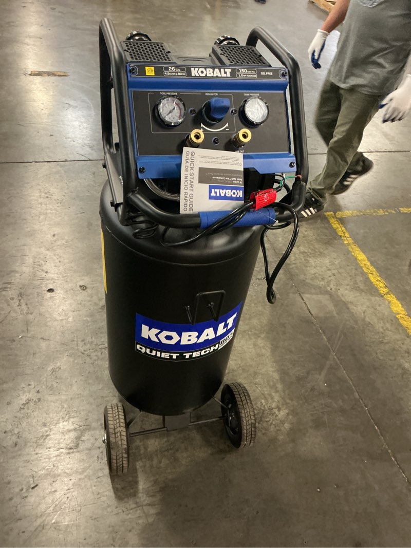 Condition photo showing As Is for kobalt quiet tech 26-gallon portable electric 150 psi vertical air compressor