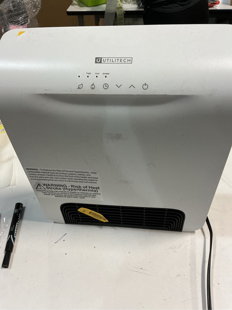 Condition photo showing As Is for 500+ bought last week Utilitech 1500-Watt 120 -Volt Heater fan Heater ( 14.76-in L x 16.93-in H Grille )