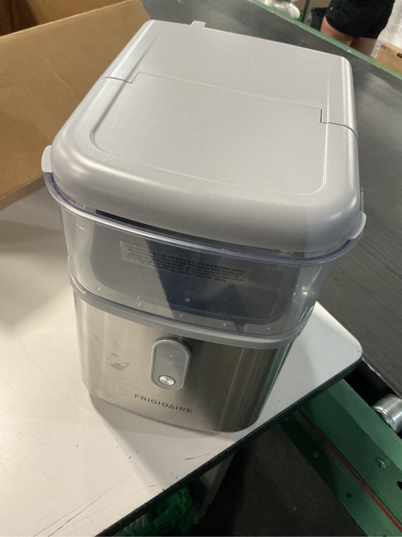 Condition photo showing As Is for frigidaire countertop crunchy chewable nugget ice maker, compact, 33lbs per day, metallic finish