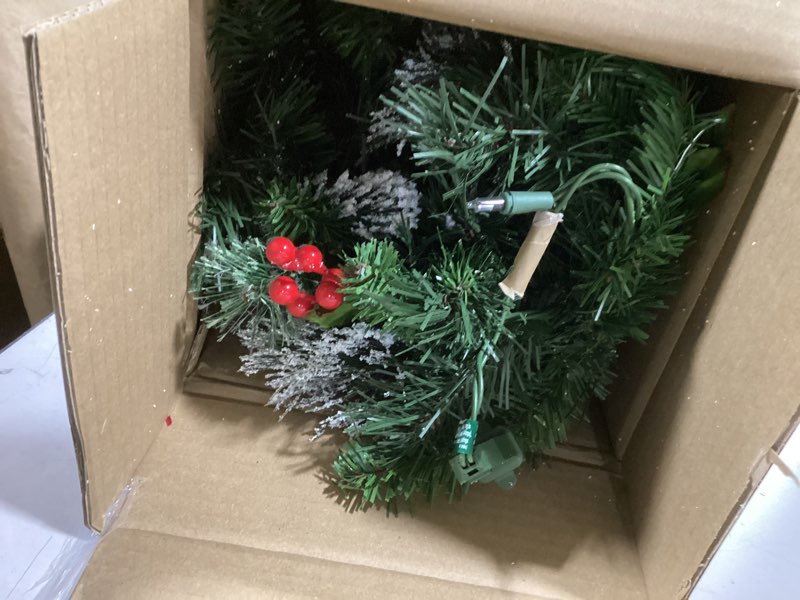 Condition photo showing Good Condition for Pre-lit Christmas Garland 9FT with 100 Warm Lights, Battery Operated Xmas Garland with Long Snow Cedar Cones & Red Berries, Christmas Decoration for Mantle, Fireplace, Stair Railing, Porch Snow Tipped Pine