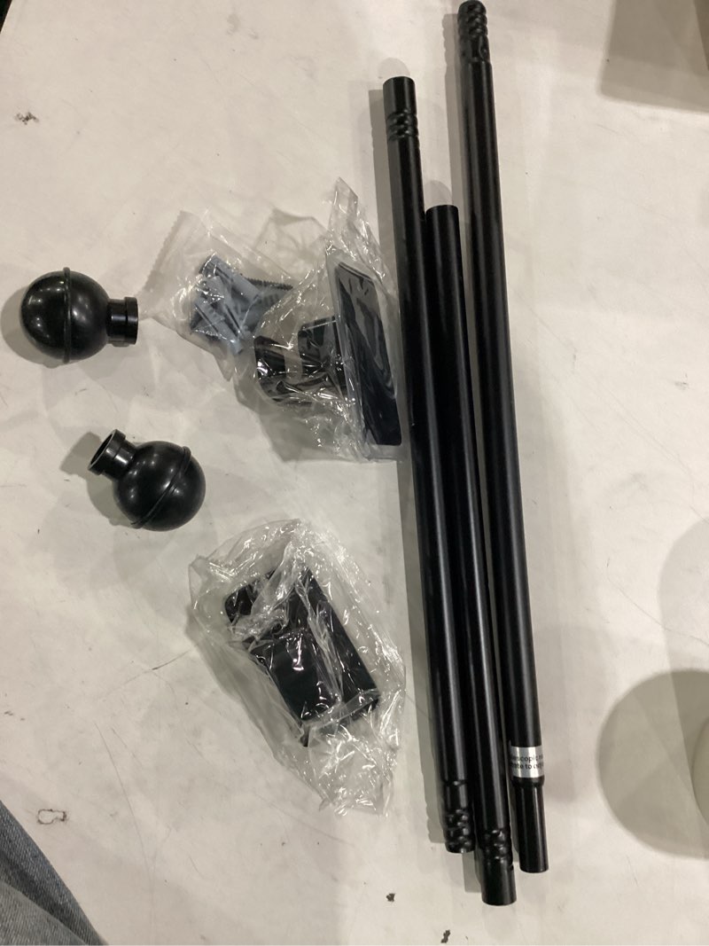 Condition photo showing New/Like New for enjoybasics no drill curtain rods for window 28 to 47 inches, 5/8 inch diameter renter friendly drapery rod with adhesive brackets without drilling, adjustable from 27 to 52 inches, black black 27-52"