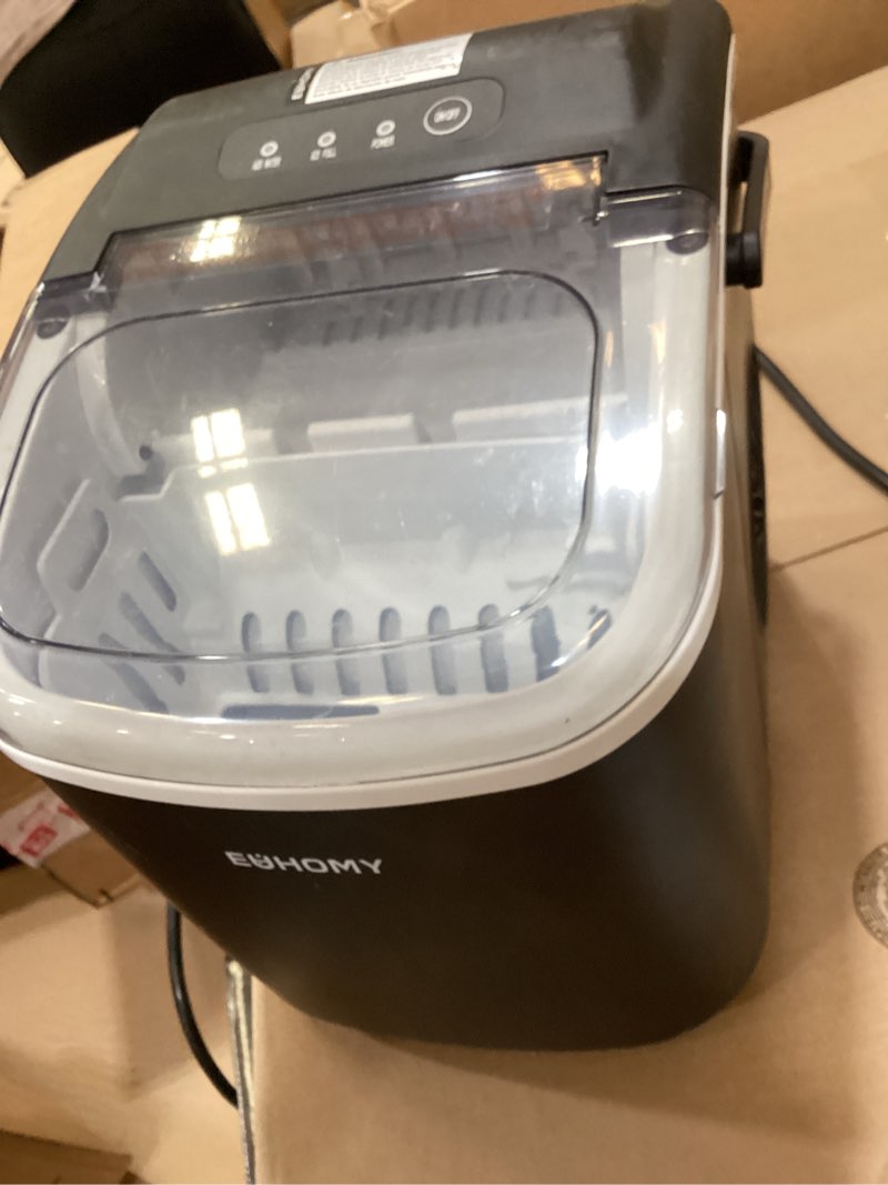 Condition photo showing Good Condition for euhomy countertop ice maker machine with handle, 26lbs in 24hrs, 9 ice cubes ready in 6 mins, auto-cleaning portable ice maker with basket and scoop, for home/kitchen/camping/rv. (black)
