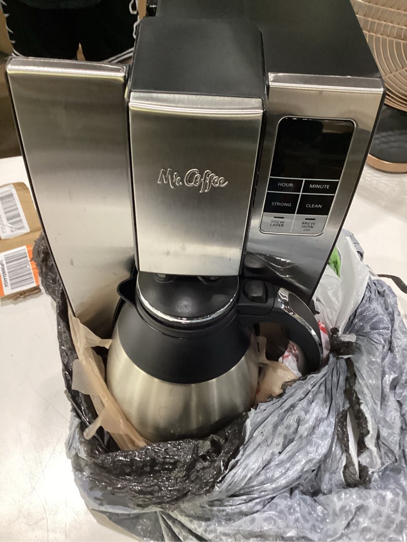 Condition photo showing As Is for mr. coffee 10-cup programmable coffee maker, insulated thermal carafe, brew strength selection, brew now or later, stainless steel stainless steel 10 cup thermal carafe + strong brew, not tested, incomplete