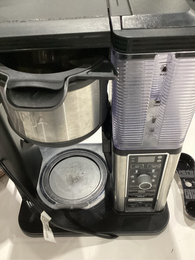 Condition photo showing As Is for ninja specialty coffee maker, hot & iced coffee, 6 brew styles, 8 sizes, small cup to travel mug, 10-cup carafe, fold-away frother, permanent filter, removable reservoir, black, cm401 10 cup