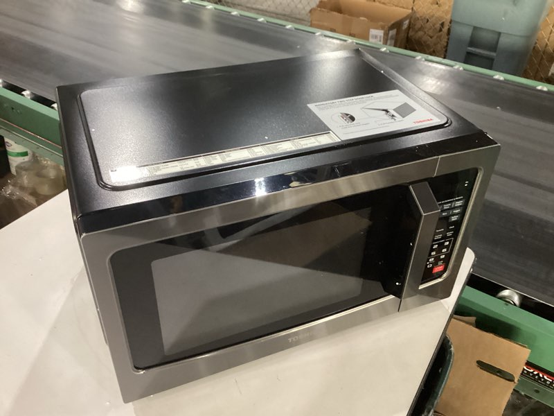 Condition photo showing Good Condition for *not tested* toshiba em131a5c-bs countertop microwave ovens 1.2 cu ft, 12.4\" removable turntable smart humidity sensor 12 auto menus mute function eco mode easy clean interior black color 1000w 1.2 cu.ft