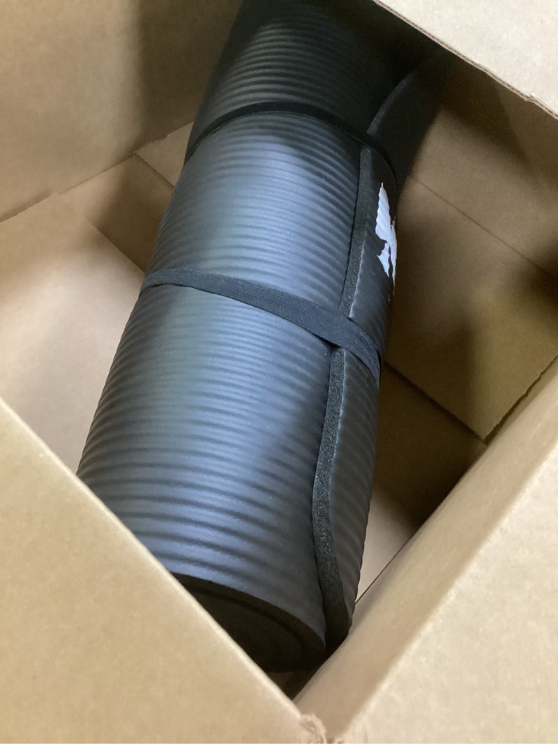 Condition photo showing Good Condition for Amazon Basics Extra Thick Exercise Yoga Mat with Carrying Strap Black 1/2 Inch