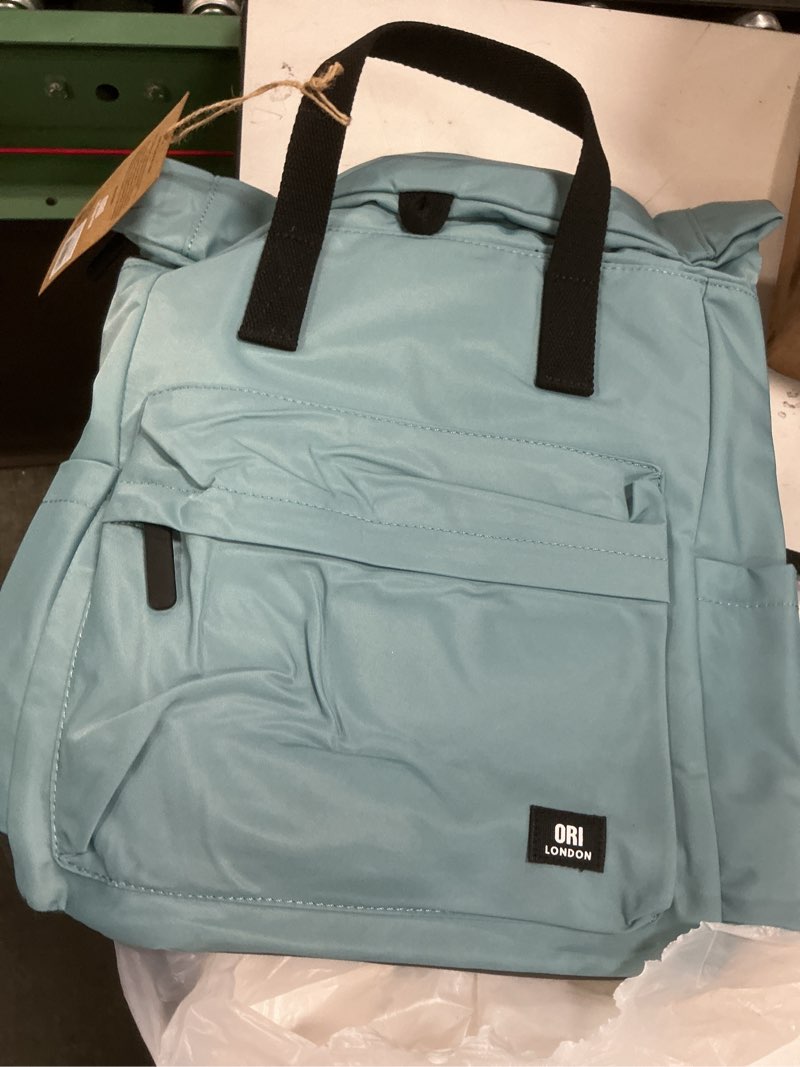 Condition photo showing New/Like New for ori london travel backpack - medium nylon rolltop backpack for men & women with multiple pockets for laptop, phone, keys, wallet, bottles - the canfield, spearmint, 16.5x11.8x4.7” blue label spearmint