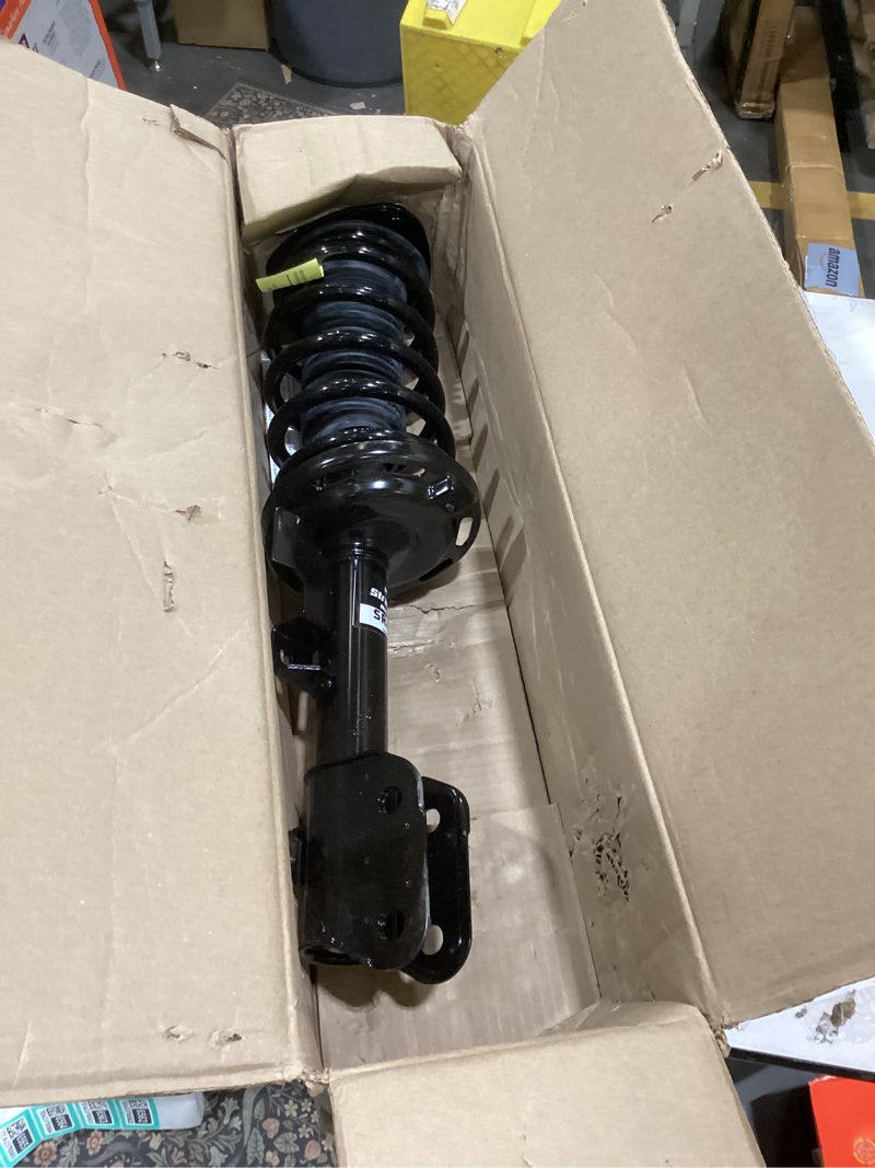 Condition photo showing As Is for KYB SR4494 Strut-Plus Complete Corner Unit Assembly -Strut, Mount and Spring