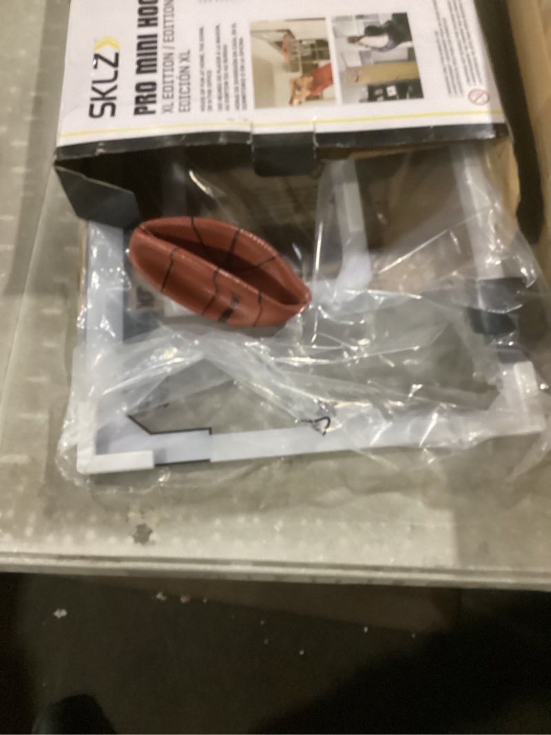 Condition photo showing As Is for sklz pro mini indoor basketball hoop - over the door – portable - great for home, dorms, offices, and gifts xl