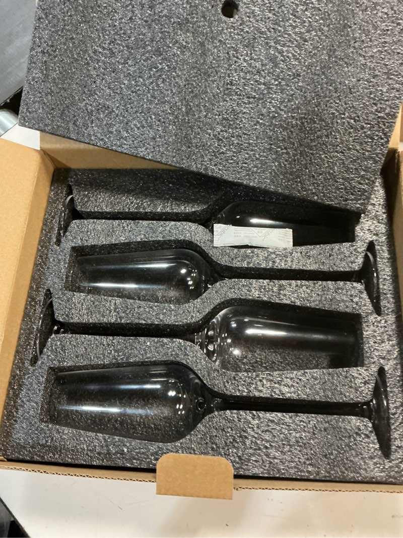 Condition photo showing New/Like New for quince set of 4 mouth blown champagne flute