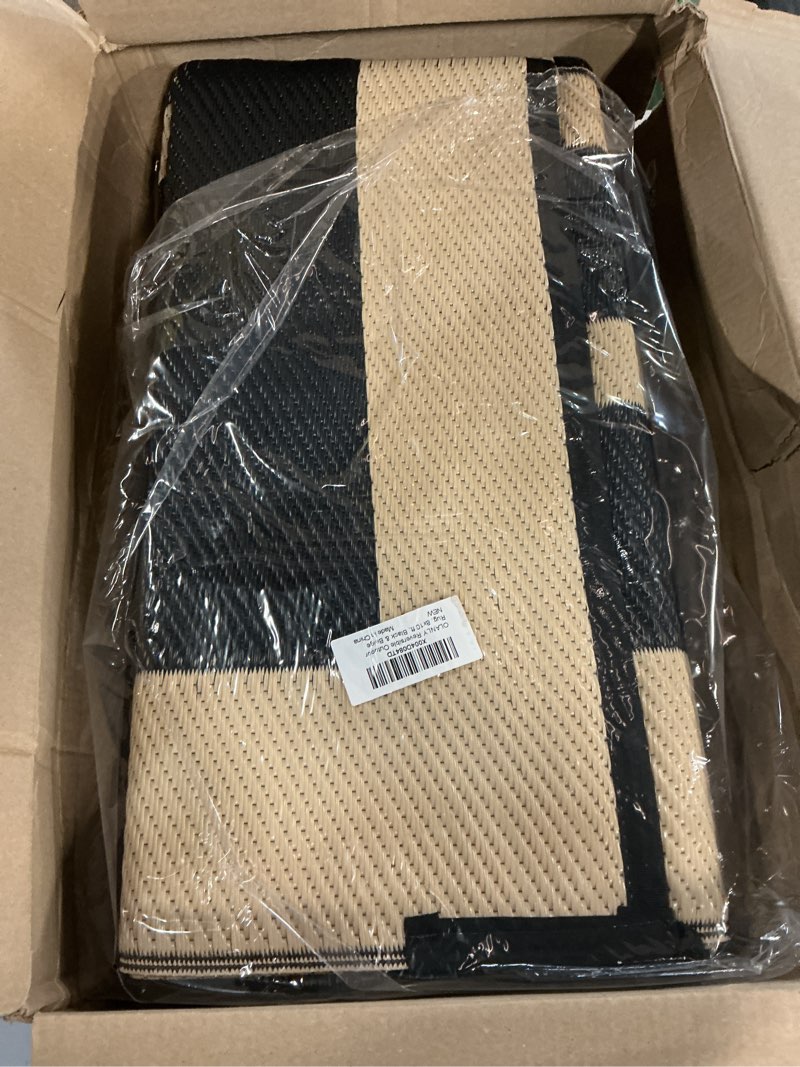 Condition photo showing Good Condition for olanly outdoor rug 8x10 ft waterproof, reversible outdoor plastic straw rug, rv mat, indoor outdoor carpet clearance for patio, camping, balcony, deck, backyard, black & beige 8' x 10' black & beige
