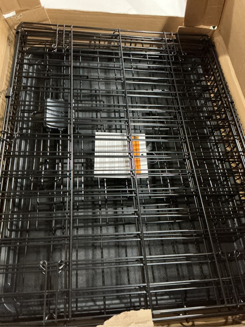 Condition photo showing New/Like New for Amazon Basics Durable, Foldable Metal Wire Small Dog Crate with Tray, Single Door, 24 x 18 x 20 in, Black 24 x 18 x 20 in Single Door w/ Divider