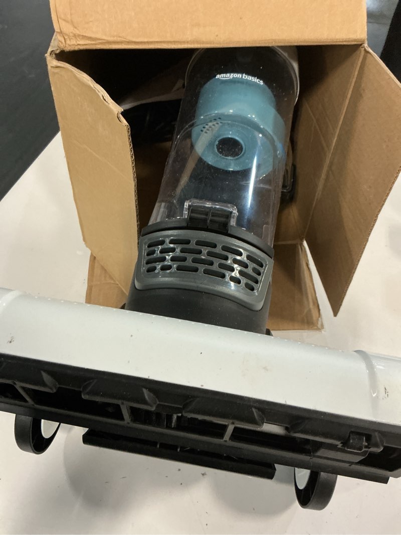Condition photo showing Good Condition for Amazon Basics Upright Bagless Lightweight Vacuum Cleaner, Black and White