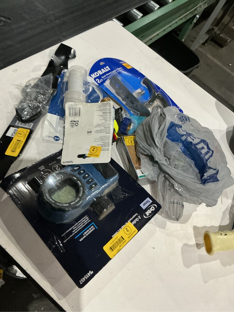 Condition photo showing As Is for assorted home improvement lot (small tools, screw, home accessories, etc.)
