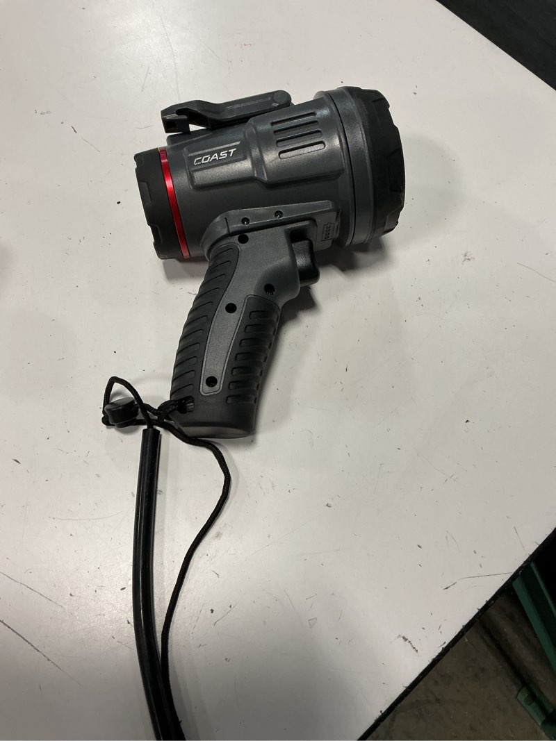 Condition photo showing As Is for coast ls20r 2500 lumen rechargeable led spotlight, 1/4 mile beam distance, sos mode, ip67 waterproof