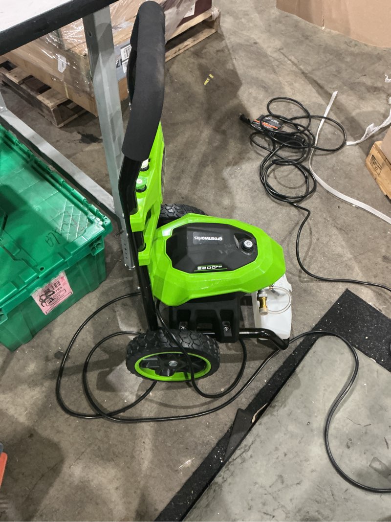 Condition photo showing As Is for greenworks 2200-psi 1.2-gpm cold water electric pressure washer with 4 spray tips