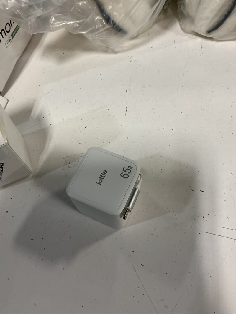 Condition photo showing Good Condition for basix by iottie 65w gan wall charger with built-in retractable usb-c cable and extra usb-c and usb-a ports, triple device fast charging, compact travel charger with folding prongs