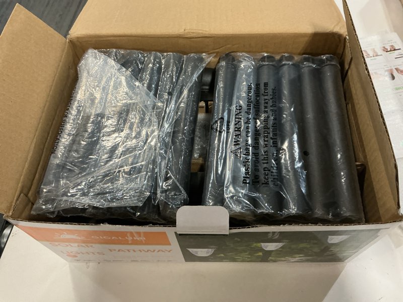 Condition photo showing New/Like New for gigalumi 12 pack solar lights outdoor waterproof, cool white pathway lights solar powered, landscape lighting, solar garden light for decor, patio, garden, yard, pathways, walkways 12 pack cold white