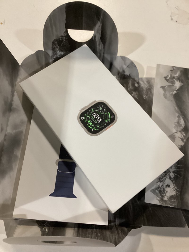 Condition photo showing New/Like New for Apple Watch Ultra 3 [GPS + Cellular 49mm] Running & Multisport Smartwatch w/Rugged Titanium Case w/Anchor Blue Ocean Band. Satellite Communications, Advanced Health & Fitness Tracking Natural Titanium Case with Anchor Blue Ocean Band One Size Without AppleCare+
