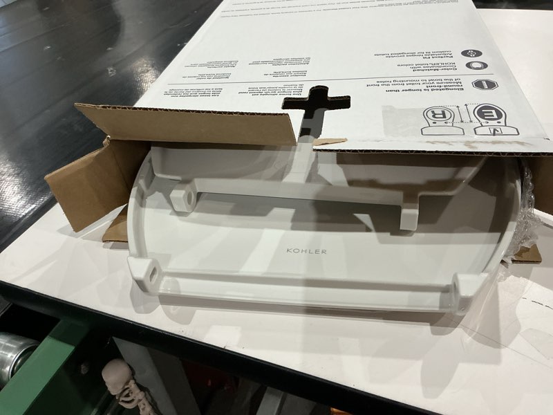 Condition photo showing As Is for kohler k-20110-0 brevia elongated toilet seat with grip-tight bumpers, quiet-close seat, quick-attach hardware, white