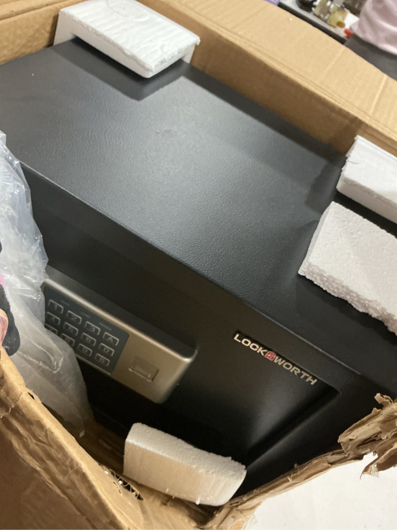 Condition photo showing As Is for Safe for Home, 0.6 Cubic Feet Safety Box, Lock Box for Money, Jewelry, Documents and Guns, Digital Security Safe for Office, Hotel and Personal Use, 13.8"W x 9.8"D x 9.8"H