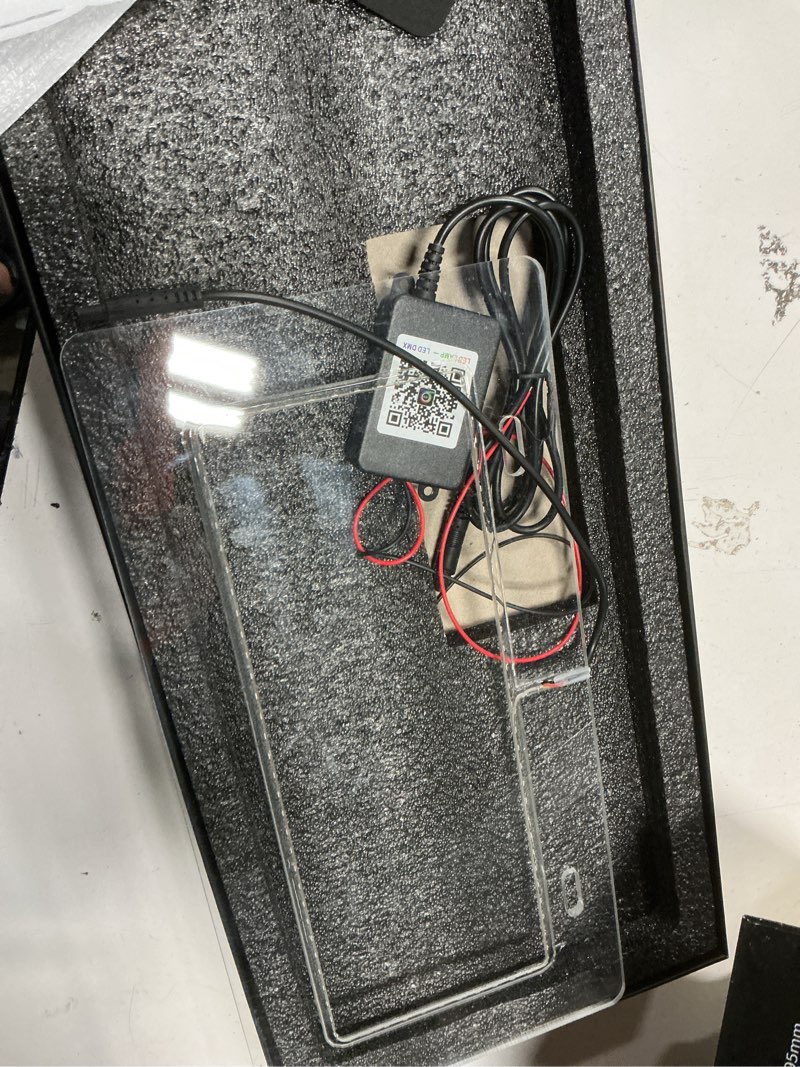 Condition photo showing As Is for Multicolour License Plate Lights APP Control 12V License Plate Frames, IP68 Waterproof Multicolor LED Chasing Halo License Plate Lights for Car Trailer UTV ATV Truck RV Boat