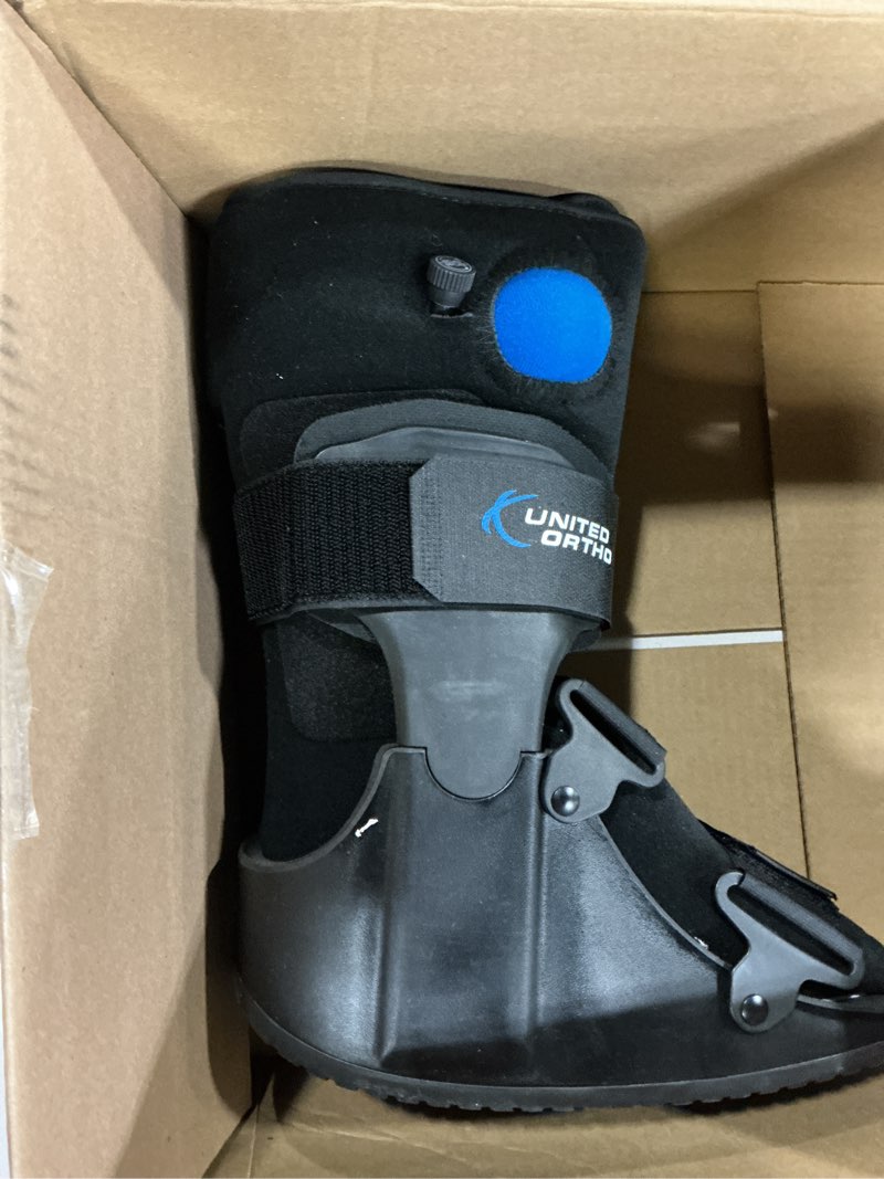 Condition photo showing Good Condition for united ortho short air cam walker fracture boot, small, black black small boot