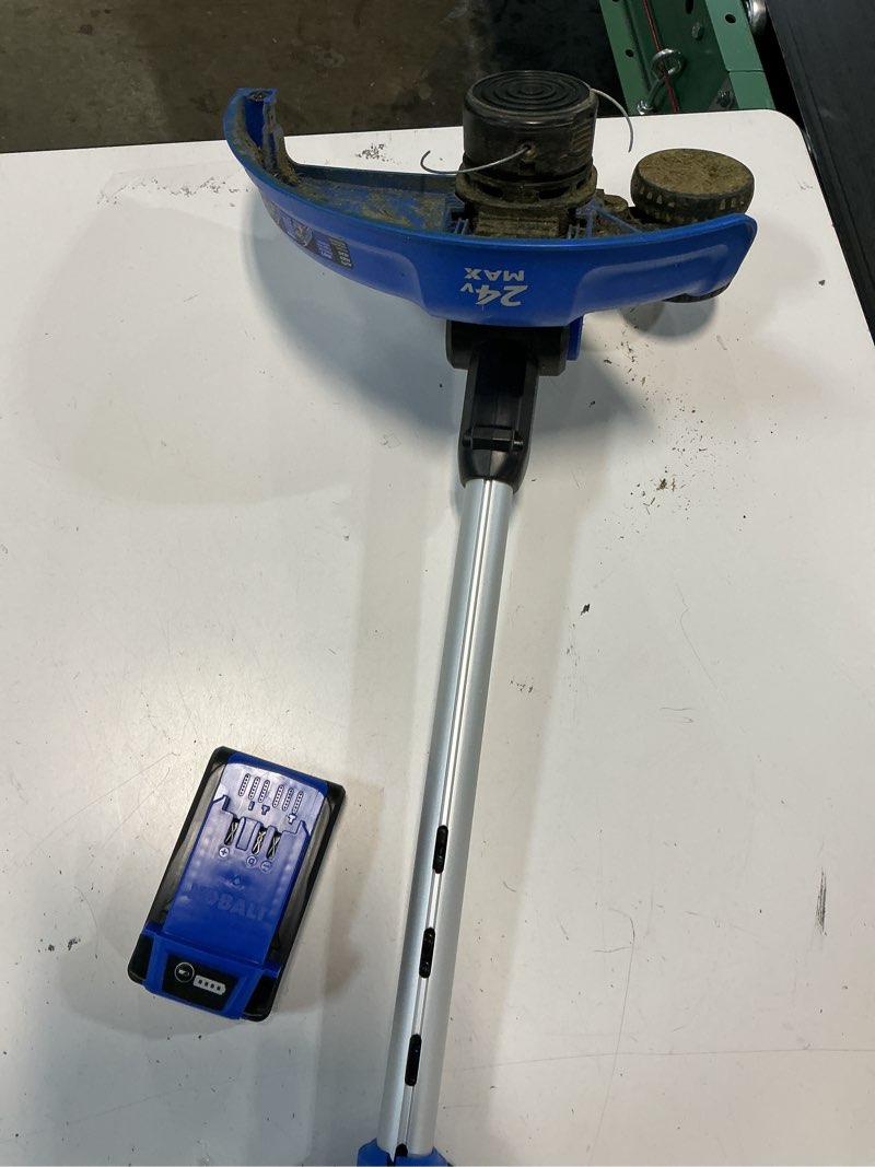 Condition photo showing As Is for kobalt 24-volt 12-in telescopic shaft battery string trimmer edger conversion capable 3 ah (battery included) (charger included)