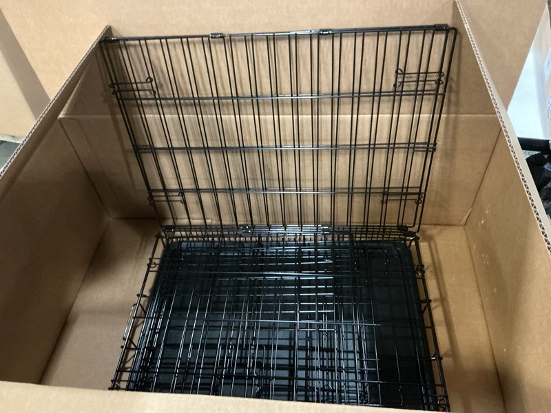 Condition photo showing Good Condition for Amazon Basics Durable, Foldable Metal Wire Small Dog Crate with Tray, Single Door, 24 x 18 x 20 in, Black 24 x 18 x 20 in Single Door w/ Divider