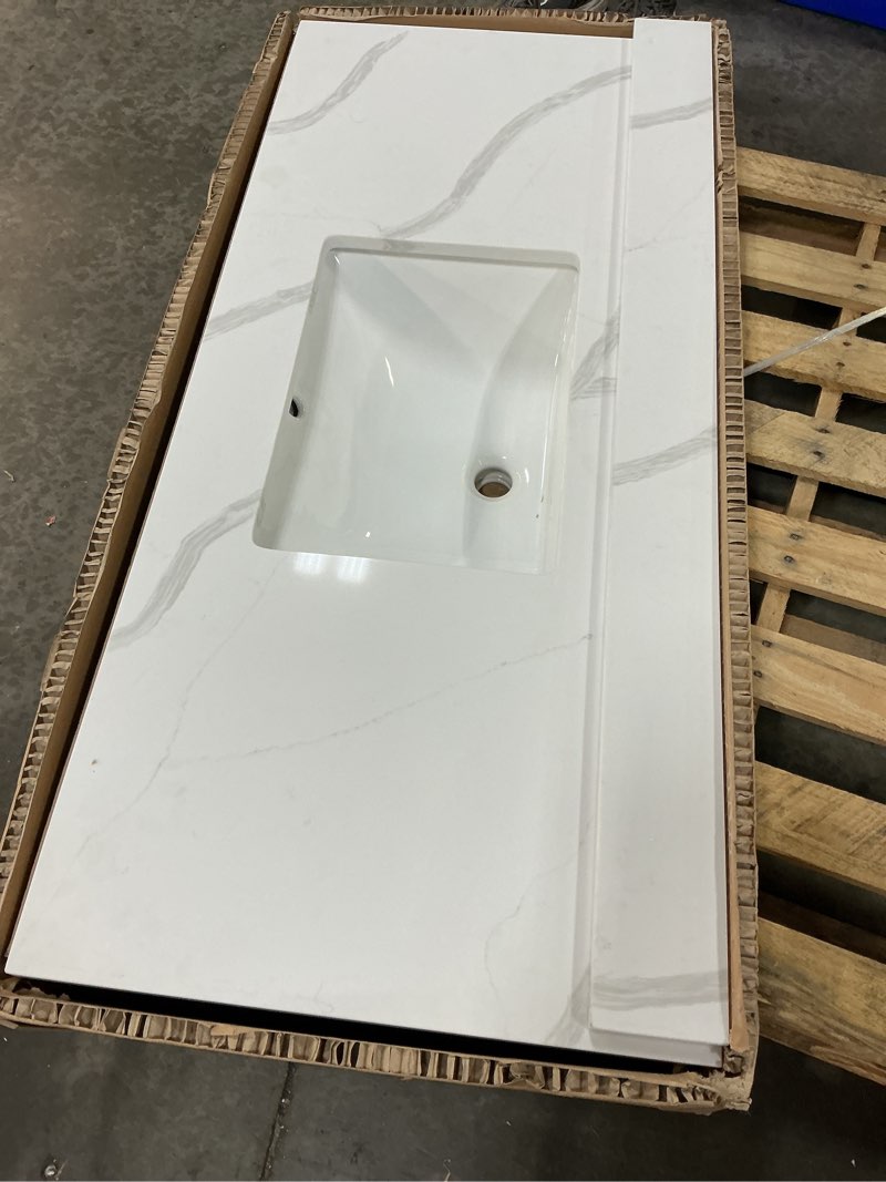 Condition photo showing Good Condition for 49  in. w x 22 in d quartz vanity top in calacatta rocky, vanity sink top with assembled single drop-in sink, pre-drilled widespread faucet holes countertop with 4\" h backsplash