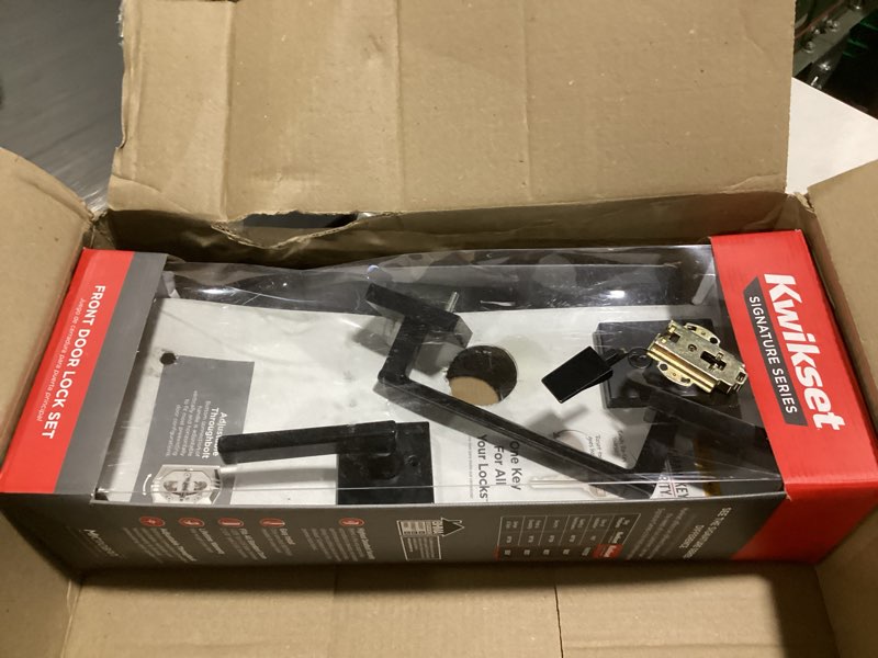 Condition photo showing As Is for kwikset san clemente front door lock handle and deadbolt set, entry handleset exterior with interior reversible lever, matte black, pick resistant smartkey rekey deadbolt security matte black with handle keyed entry