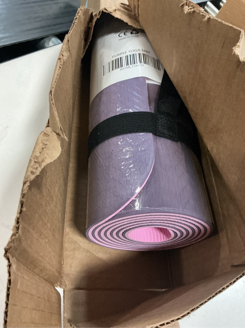 Condition photo showing Good Condition for yogati® yoga mat with strap with alignment lines. home workout mat for women, men and kids. thick non slip yoga mat for pilates and fitness. brown, pink and purple yoga mats