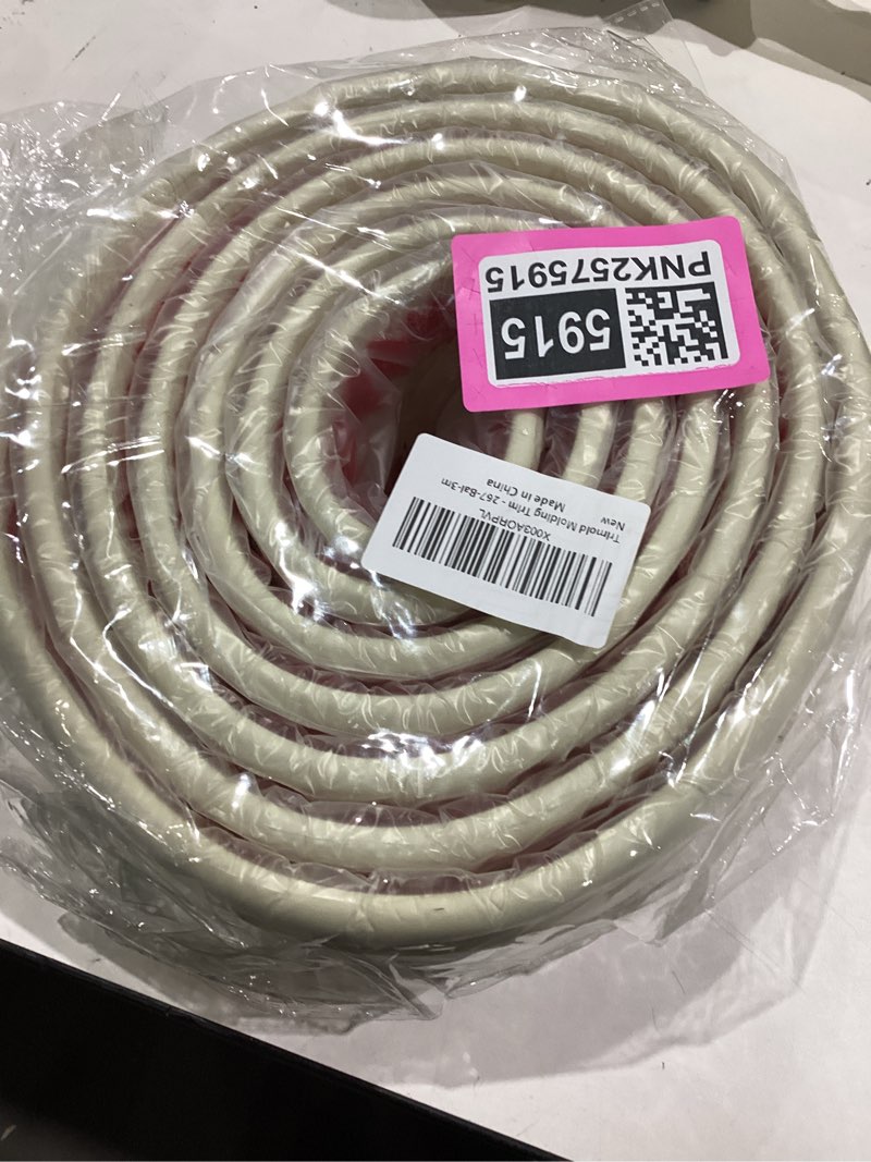 Condition photo showing Good Condition for Peel and Stick Baseboard Trim, Self-Adhesive Chair Rail Molding, Flexible Caulk and Trim Strips for Floor Wall Base and More, 16.4 Ft x 3.9 in 16.4Ft Beige (Soft and Flexible)