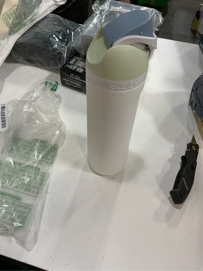 Condition photo showing As Is for owala freesip insulated stainless steel water bottle with straw for sports and travel, bpa-free, 24oz, iced breeze iced breeze 24 ounces