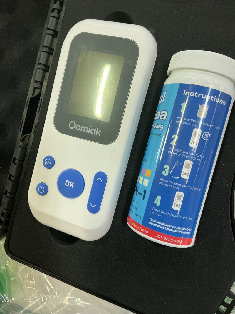 Condition photo showing As Is for digital pool water test kit with 150 test strips, oomiak 7-in-1 professional electronic water tester for cyanuric acid, total hardness, ph, chlorine, bromine, total alkalinity, for pool, spa & hot tub sapphire