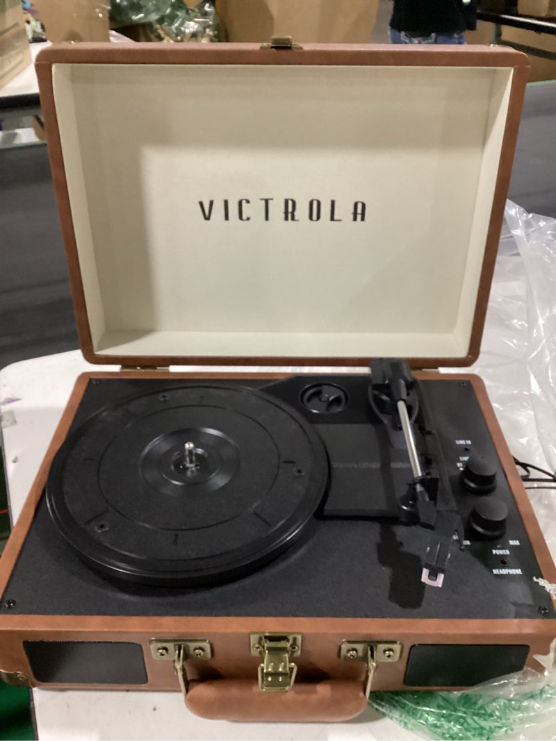 Condition photo showing As Is for victrola journey bluetooth portable suitcase record player – with built-in speakers, 3 speed vinyl record player, rca out, headphone jack (brown)