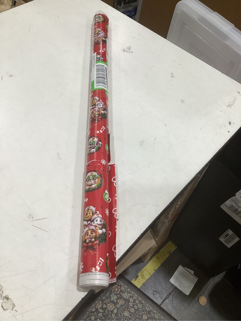 Condition photo showing As Is for american greetings kids christmas wrapping paper, paw patrol wrapping paper christmas roll, red gift wrap (1 reversible roll, 75 sq. ft.) chase, marshall, skye, rubble, paw prints sr 30 75sq pr fsc xm pawpatrol