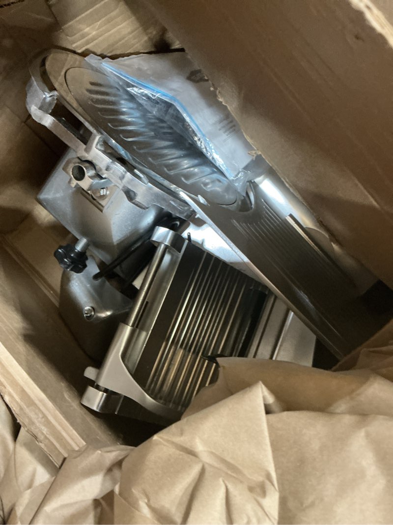 Condition photo showing As Is for kws 10ns commercial 10" electric meat slicer, 320w high-torque motor, stainless steel blade, deli-style thin slicing, built-in sharpener, heavy-duty aluminum body for meat, cheese & semi-frozen foods silver exterior with stainless steel blade