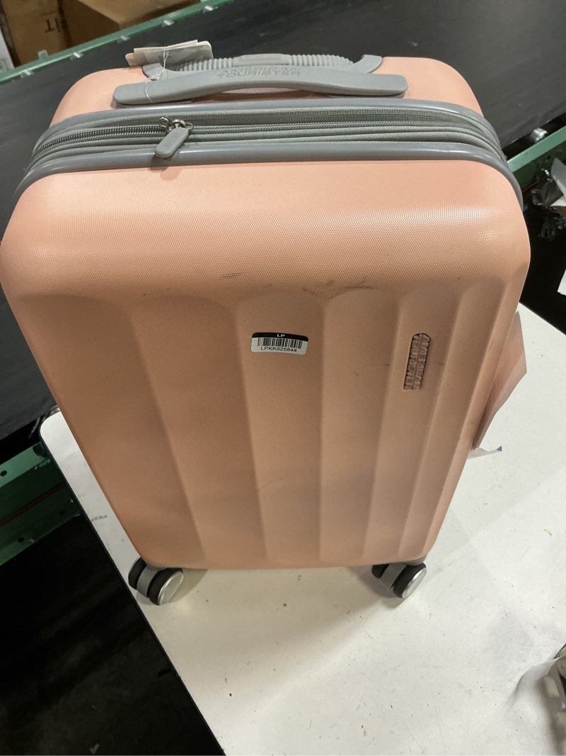 Condition photo showing As Is for american tourister multiply double expansion hardside carry on spinner suitcase - mellow peach: abs shell, spinner wheels